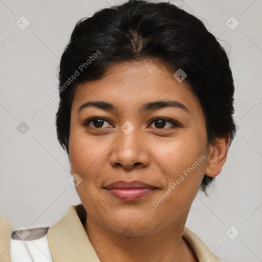 Joyful asian young-adult female with short  brown hair and brown eyes