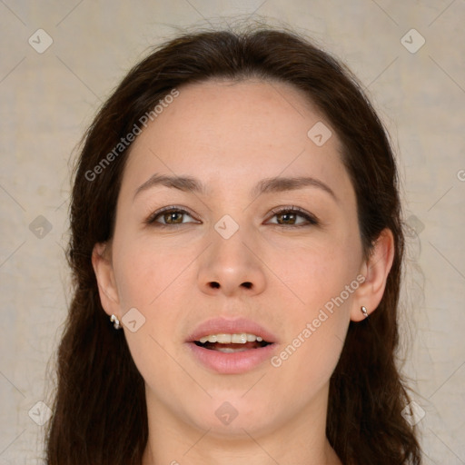 Joyful white young-adult female with long  brown hair and brown eyes