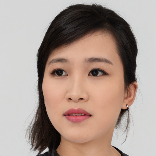 Neutral asian young-adult female with medium  black hair and brown eyes
