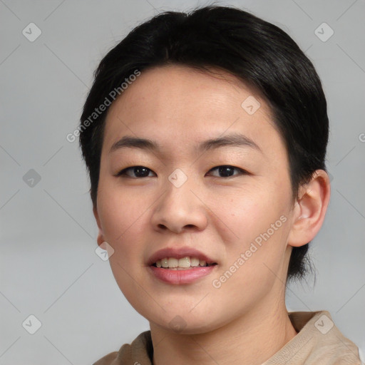 Joyful asian young-adult female with short  black hair and brown eyes