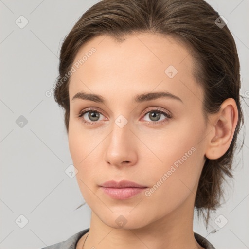 Neutral white young-adult female with medium  brown hair and brown eyes