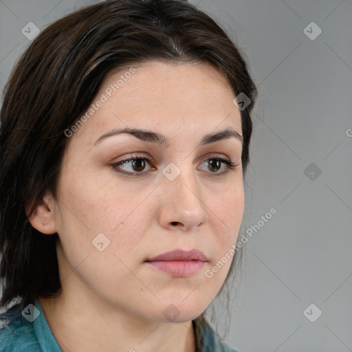 Neutral white young-adult female with medium  brown hair and brown eyes