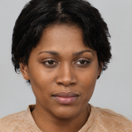 Neutral black young-adult female with short  brown hair and brown eyes