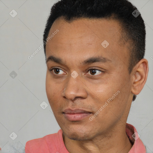 Neutral latino young-adult male with short  black hair and brown eyes