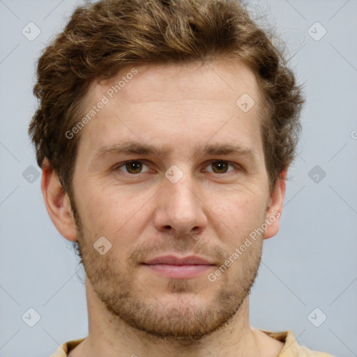 Joyful white adult male with short  brown hair and grey eyes