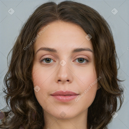 Neutral white young-adult female with medium  brown hair and green eyes