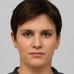 Neutral white young-adult female with short  brown hair and brown eyes