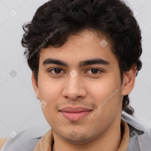 Joyful latino young-adult male with short  brown hair and brown eyes