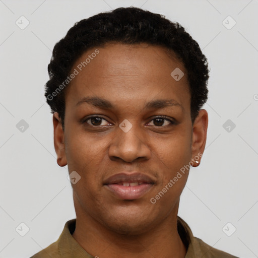 Joyful black young-adult female with short  black hair and brown eyes