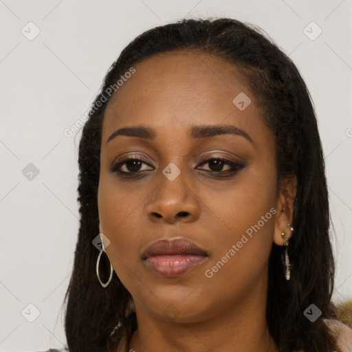 Neutral black young-adult female with long  brown hair and brown eyes