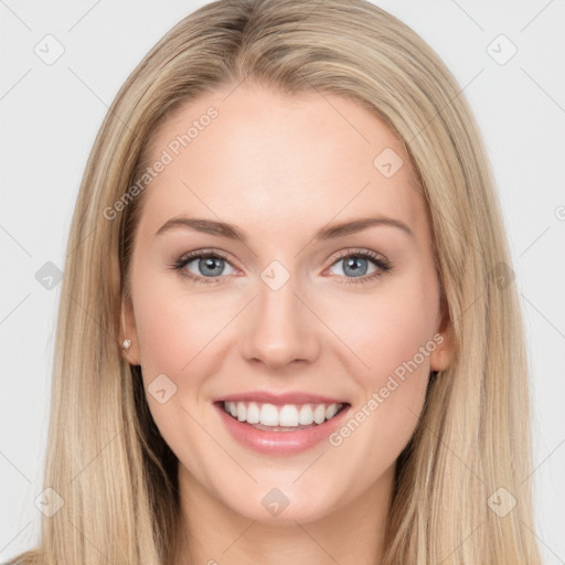 Joyful white young-adult female with long  brown hair and blue eyes