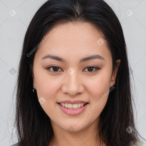 Joyful asian young-adult female with long  brown hair and brown eyes