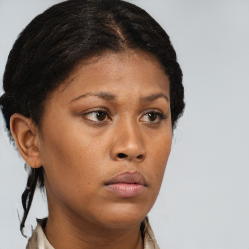 Neutral black young-adult female with short  brown hair and brown eyes