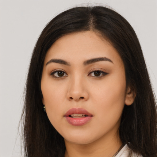 Neutral asian young-adult female with long  brown hair and brown eyes