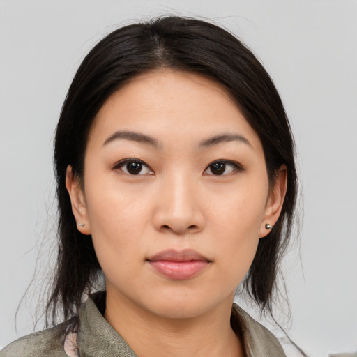 Neutral asian young-adult female with medium  black hair and brown eyes