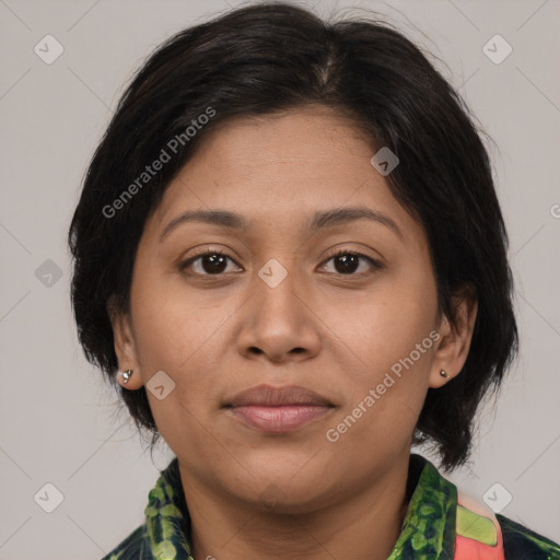 Joyful latino young-adult female with medium  brown hair and brown eyes