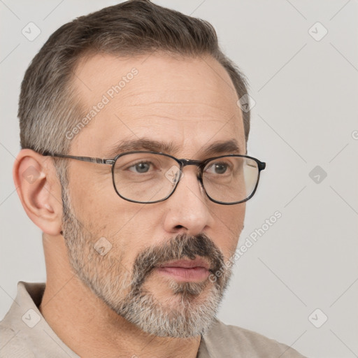 Neutral white adult male with short  brown hair and brown eyes