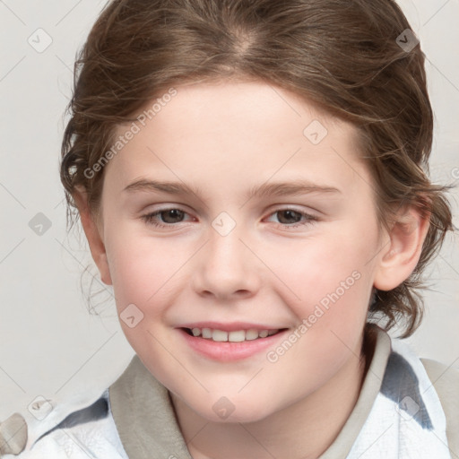 Joyful white child female with medium  brown hair and grey eyes