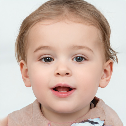 Joyful white child female with short  brown hair and brown eyes