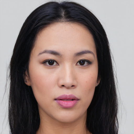 Neutral asian young-adult female with medium  black hair and brown eyes
