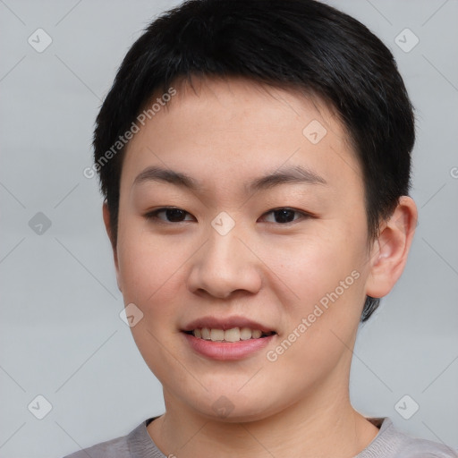 Joyful asian young-adult female with short  brown hair and brown eyes