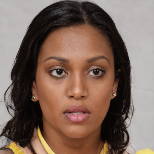 Neutral latino young-adult female with long  brown hair and brown eyes
