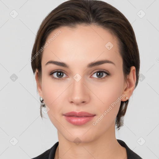 Neutral white young-adult female with medium  brown hair and brown eyes