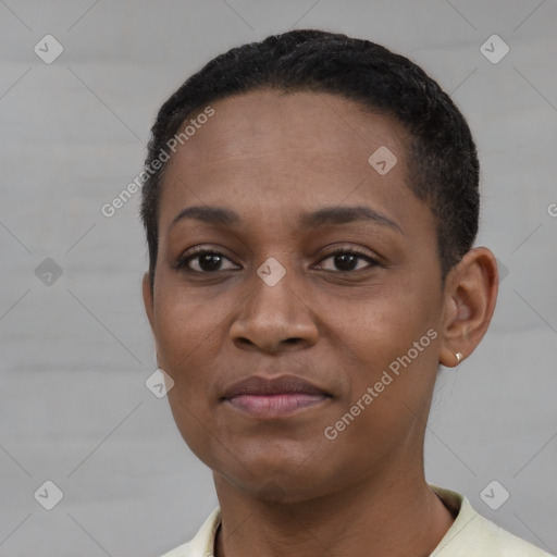 Joyful black young-adult female with short  black hair and brown eyes