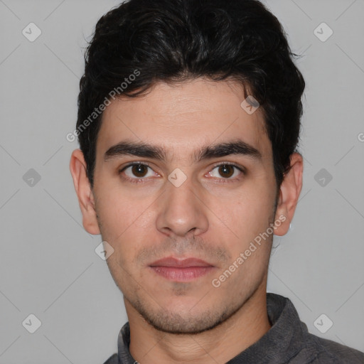 Neutral white young-adult male with short  black hair and brown eyes