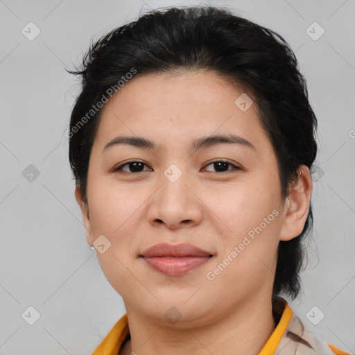 Joyful asian young-adult female with short  brown hair and brown eyes