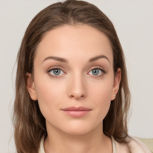 Neutral white young-adult female with long  brown hair and grey eyes