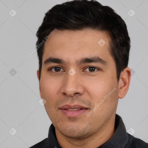 Joyful white young-adult male with short  black hair and brown eyes