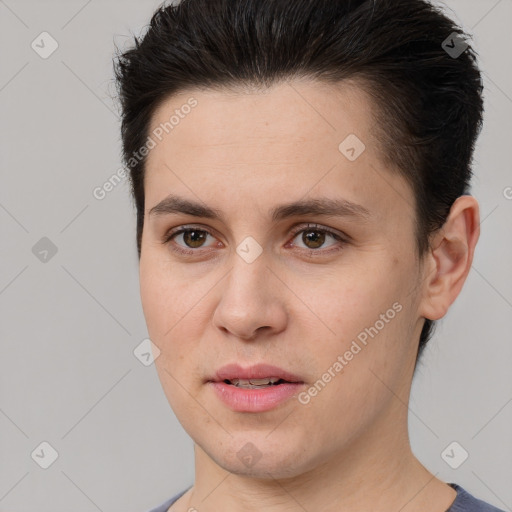 Joyful white young-adult female with short  brown hair and brown eyes