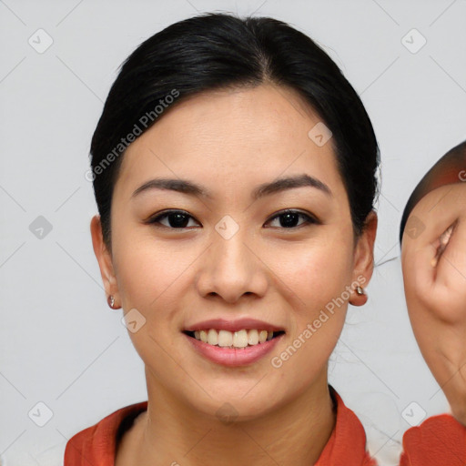 Joyful asian young-adult female with medium  brown hair and brown eyes