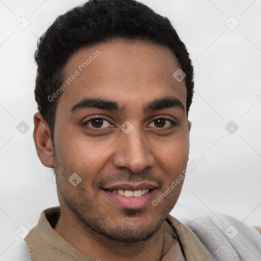 Joyful latino young-adult male with short  brown hair and brown eyes