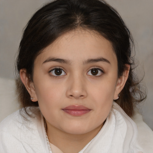 Joyful white child female with medium  brown hair and brown eyes