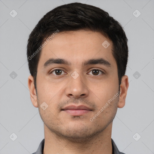 Neutral white young-adult male with short  black hair and brown eyes