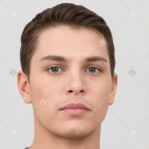 Neutral white young-adult male with short  brown hair and grey eyes