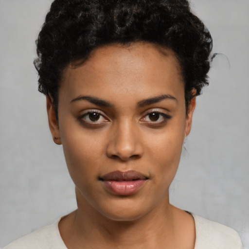 Neutral latino young-adult female with short  black hair and brown eyes