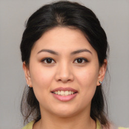 Joyful white young-adult female with medium  brown hair and brown eyes