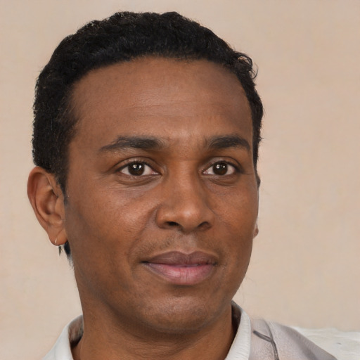 Neutral black young-adult male with short  brown hair and brown eyes