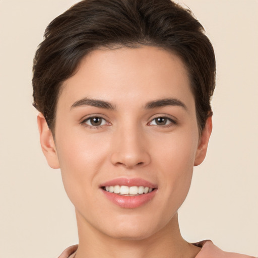 Joyful white young-adult female with short  brown hair and brown eyes