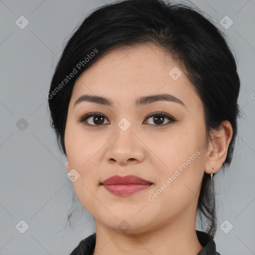 Joyful white young-adult female with medium  black hair and brown eyes