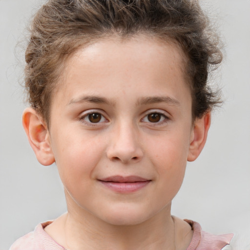 Joyful white child female with short  brown hair and brown eyes