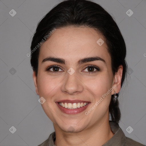 Joyful white young-adult female with medium  brown hair and brown eyes