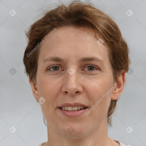 Joyful white adult female with short  brown hair and brown eyes