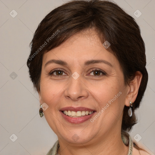 Joyful white adult female with medium  brown hair and brown eyes