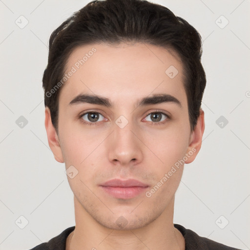 Neutral white young-adult male with short  brown hair and brown eyes