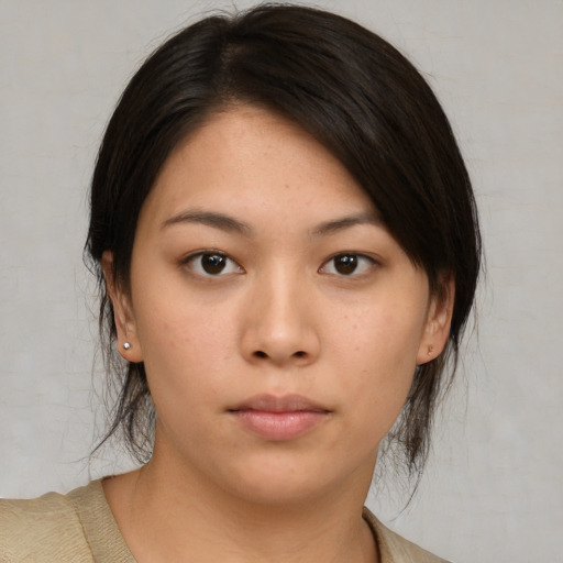 Neutral asian young-adult female with medium  brown hair and brown eyes