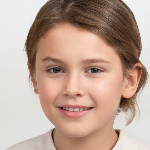 Joyful white child female with medium  brown hair and brown eyes